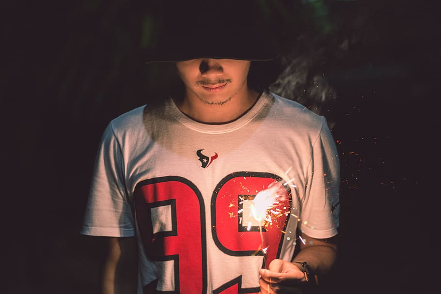 night, spark, sparkles, bokeh, one person, young adult, front view HD wallpaper
