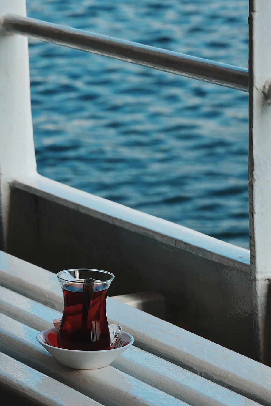 Clear Glass Turkish Teacup Beside Window, bench, blurred background HD wallpaper