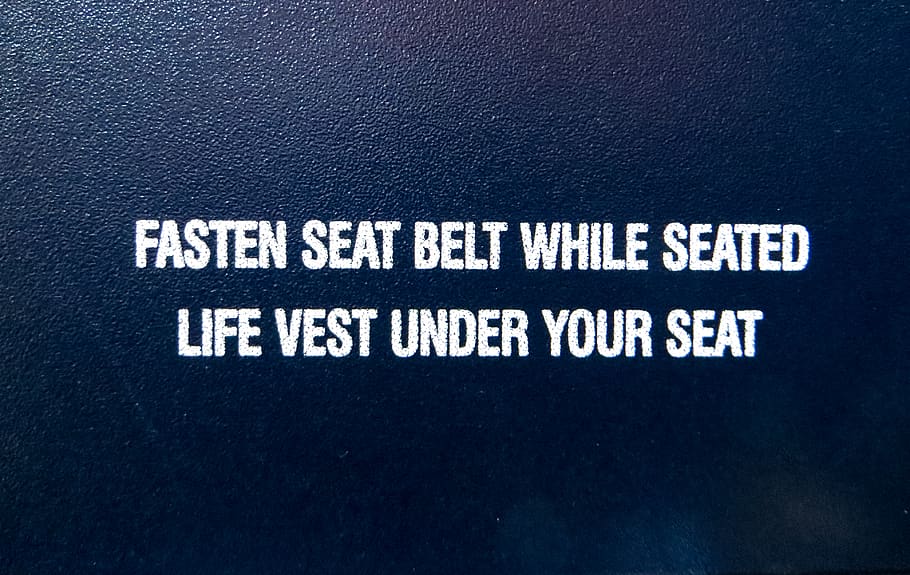 Fasten Seat Belt While Seated Life Vest Under Your Seat Text Overlay HD wallpaper