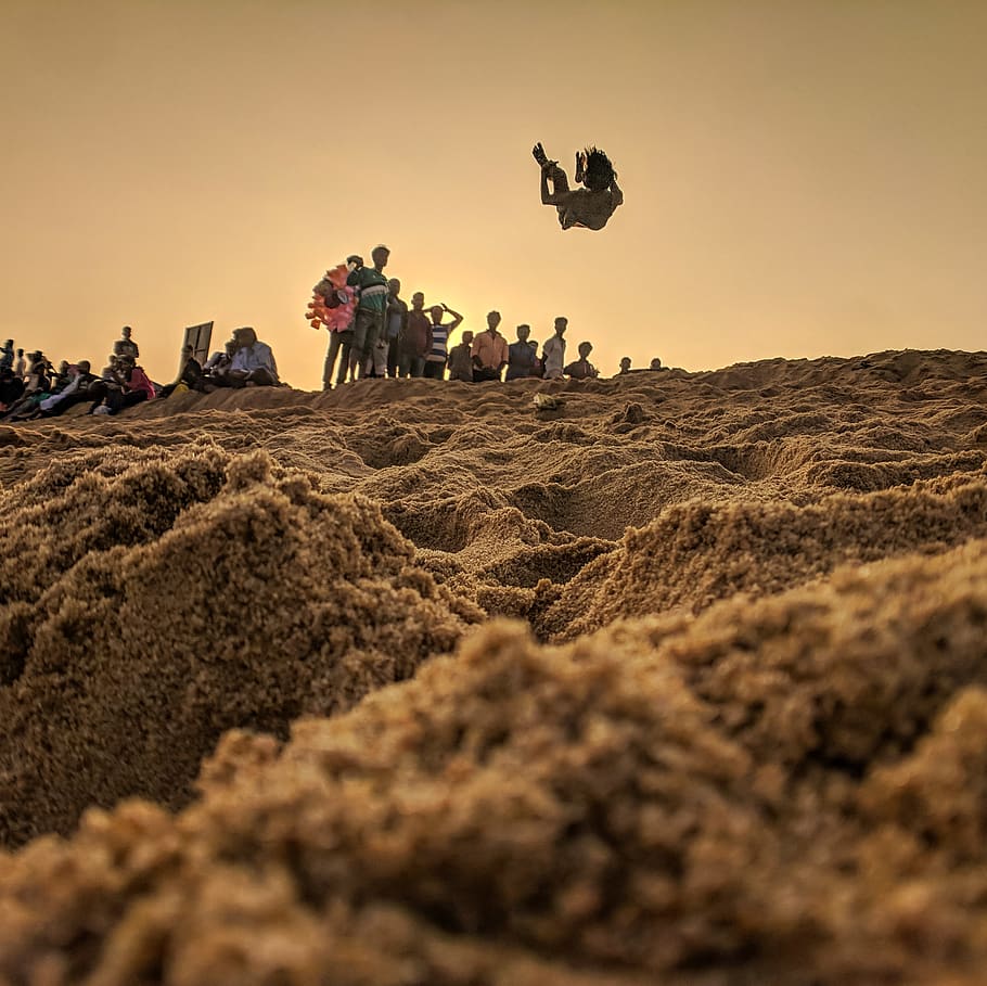 People Standing on Brown Sand, action, adventure, beach, crowd HD wallpaper