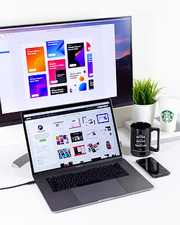 black and gray laptop computer beside black mug, iphonex, work environment HD wallpaper