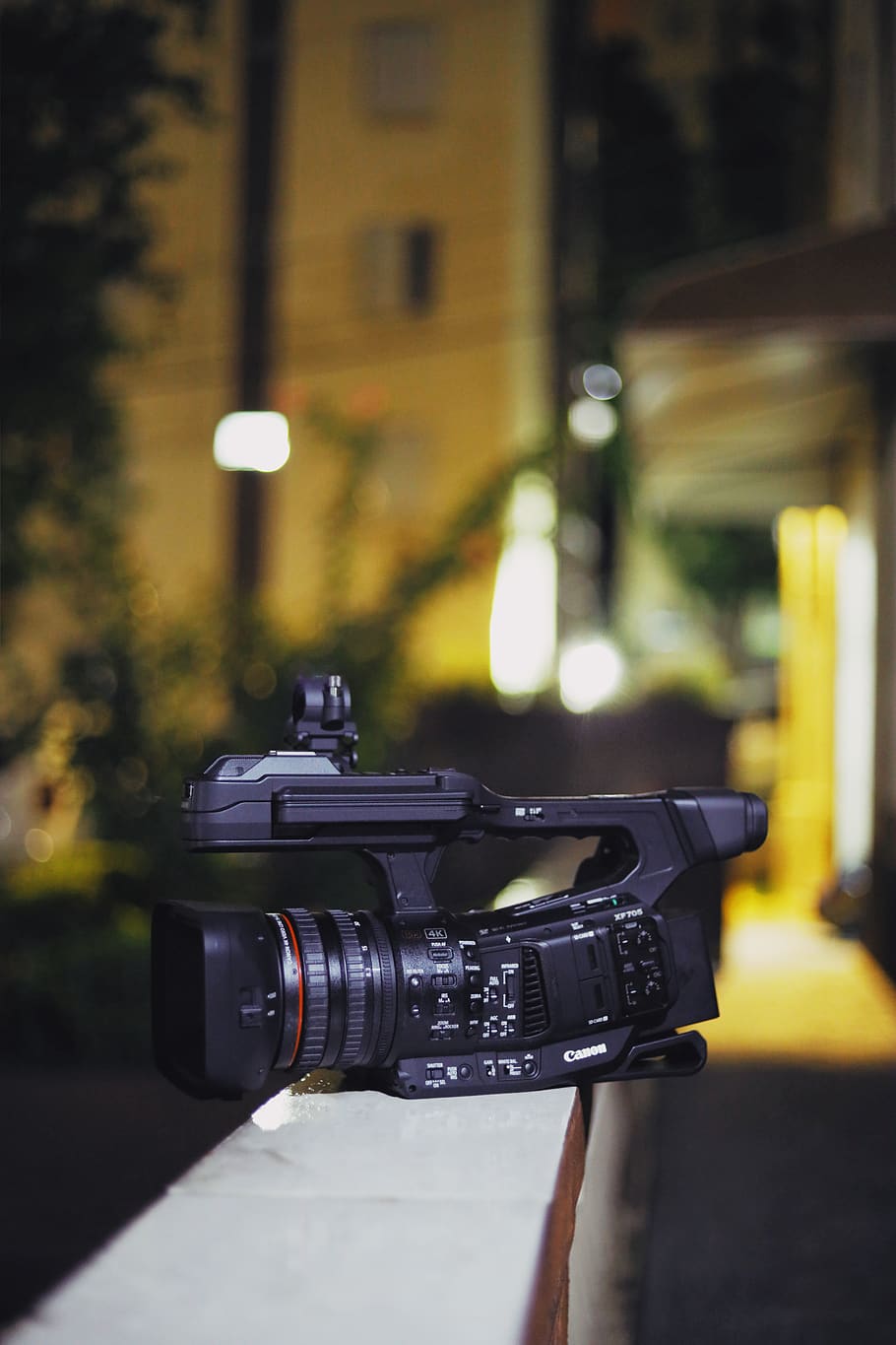 Selective Focus Photography of Video Camera on White Pavement HD wallpaper