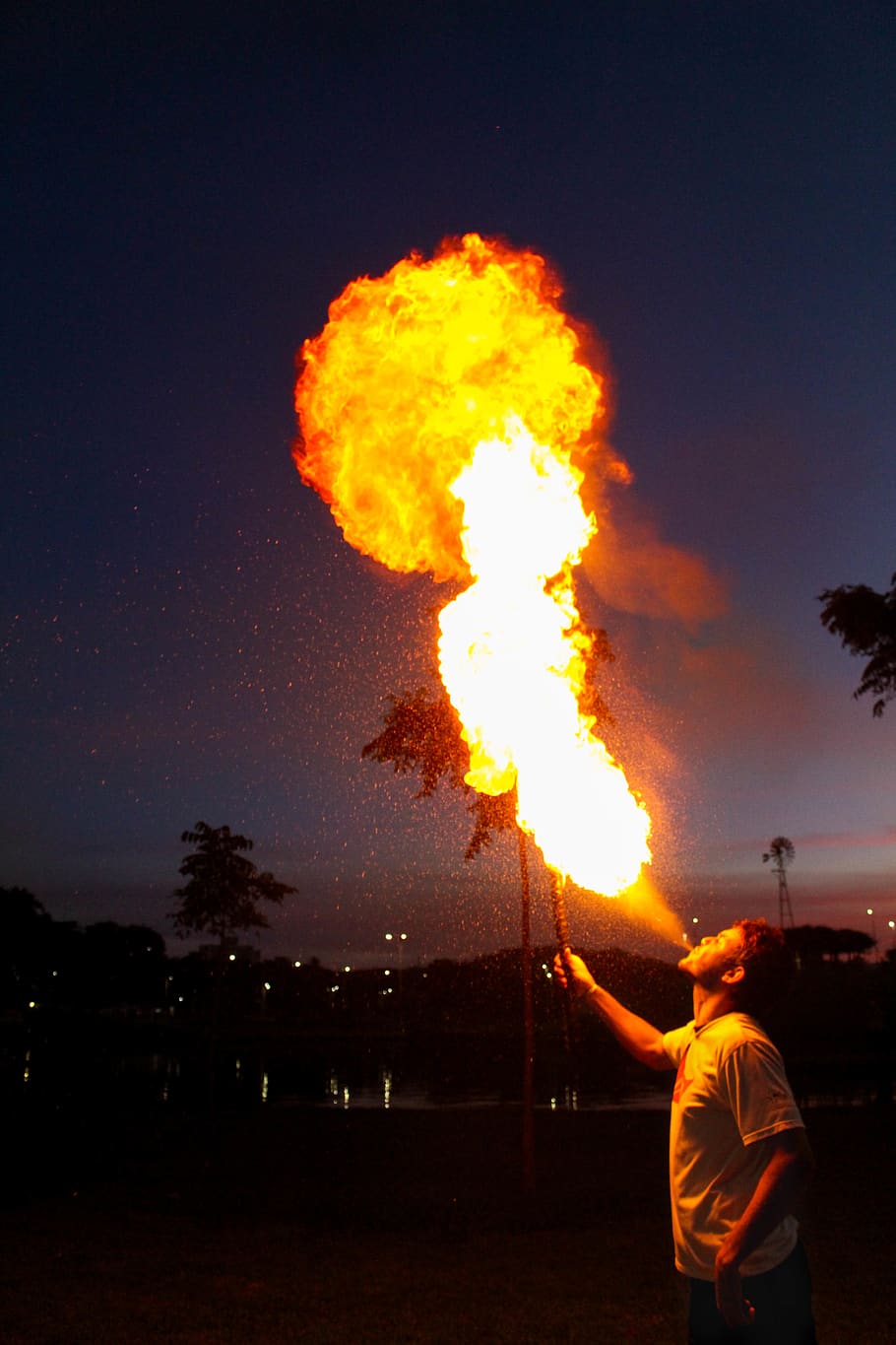 Man Blowing Fire, action, backlit, blazing, burning, celebration HD wallpaper