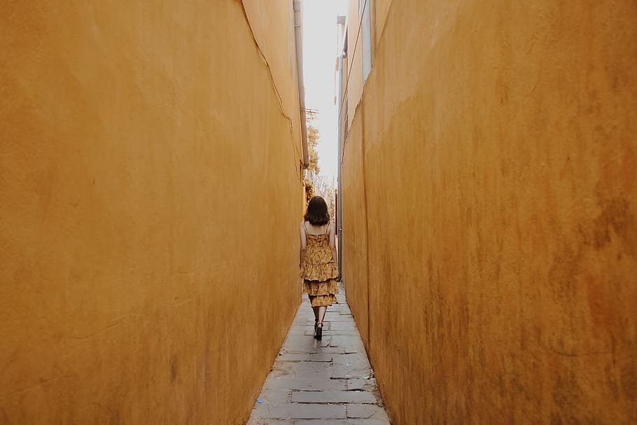Photo of Woman Walk Through Pathway, architecture, back view HD wallpaper