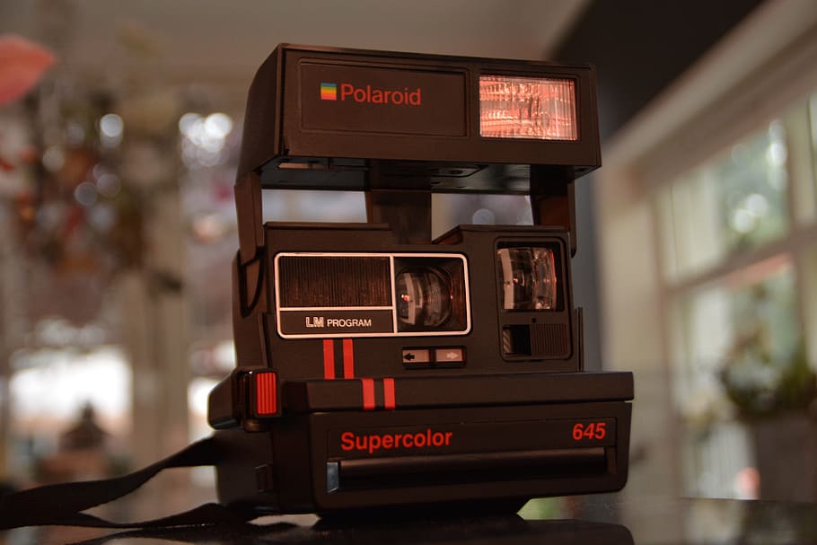 Black Polaroid Supercolor Camera on Black Table, macro, retro HD wallpaper
