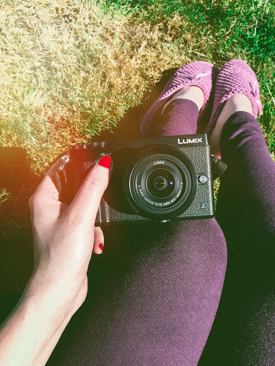 Person Holding Black Lumix Point-and-shoot Camera, camera lens HD wallpaper