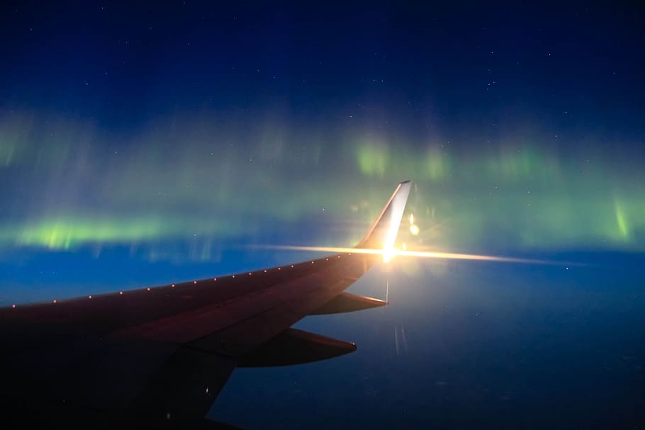 aurora borealis, delta, plane, night, wing, stars, human hand, HD wallpaper