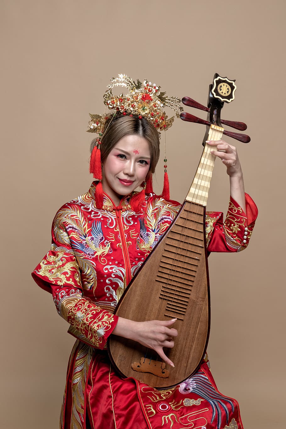 woman holding string instrument while smiling, one person, front view HD wallpaper