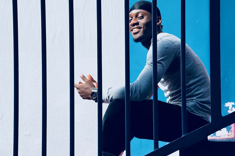 man sitting on stairs, prison, person, human, paris, pigalle basketball HD wallpaper
