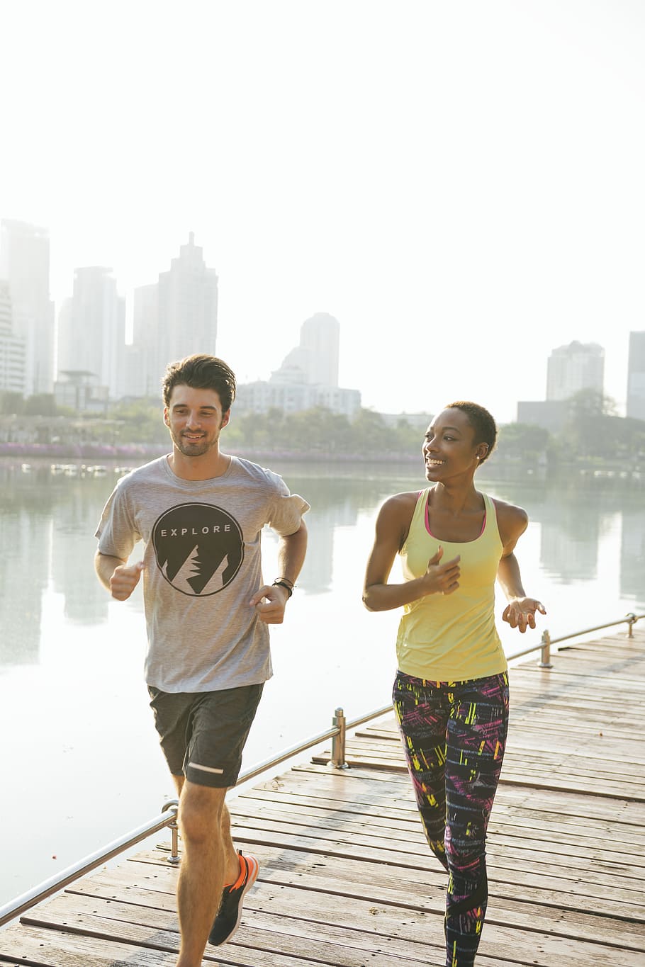 Man and Woman Jogging Near Body of Water, activity, adults, athletes, HD wallpaper