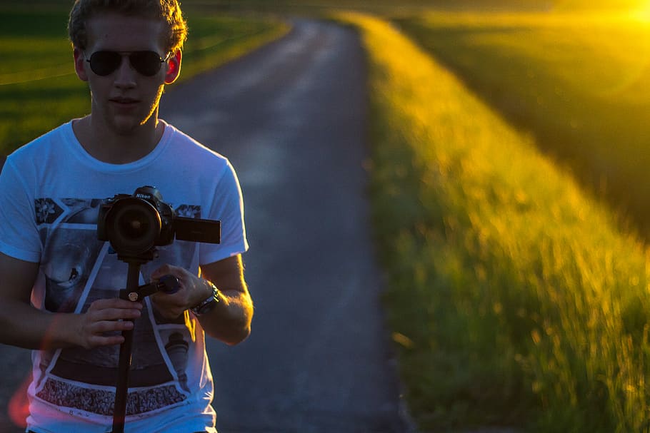 canon, nikon, shooting, front view, camera - photographic equipment HD wallpaper