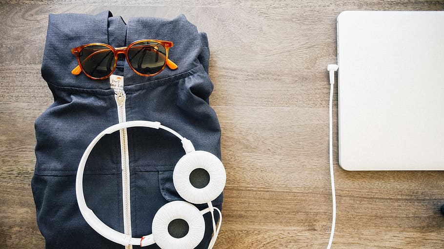 Flat-lay Photography of Black Pullover Beside Laptop on Table HD wallpaper