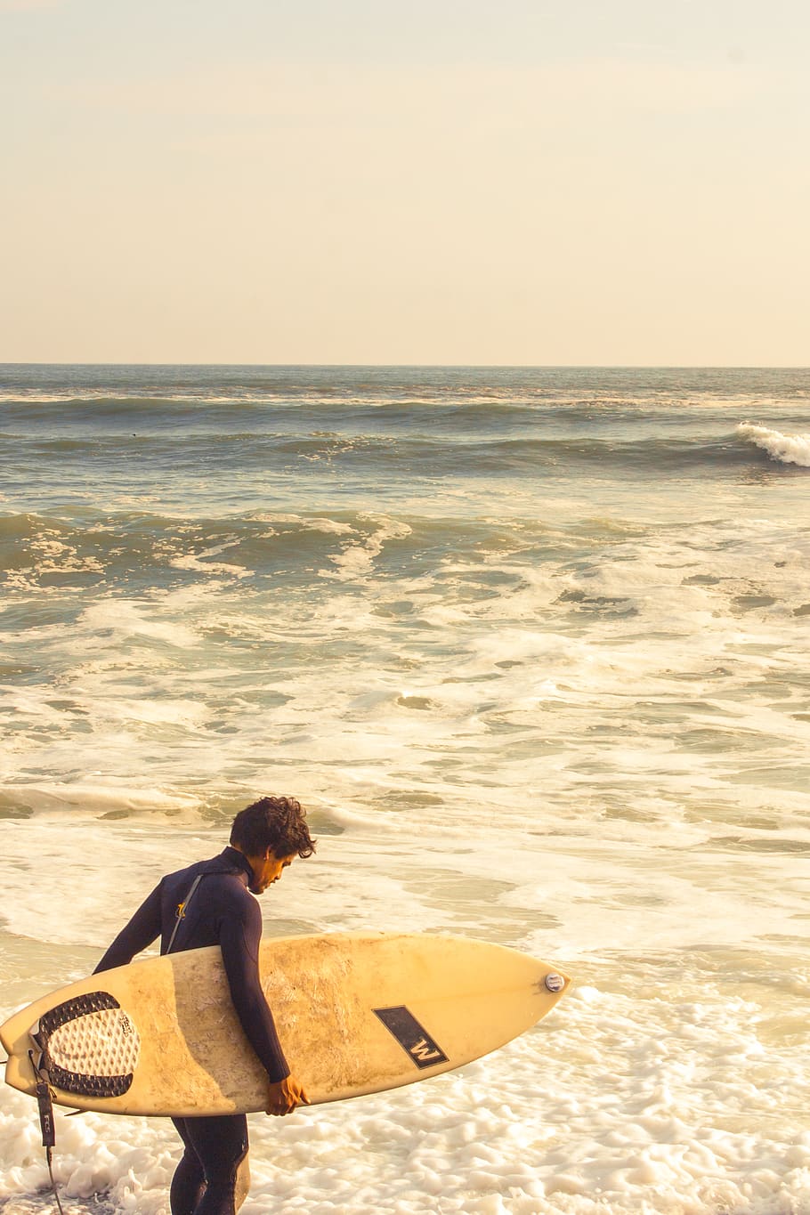 Man Carrying Surfboard Near Shoreline, beach, daylight, ocean HD wallpaper