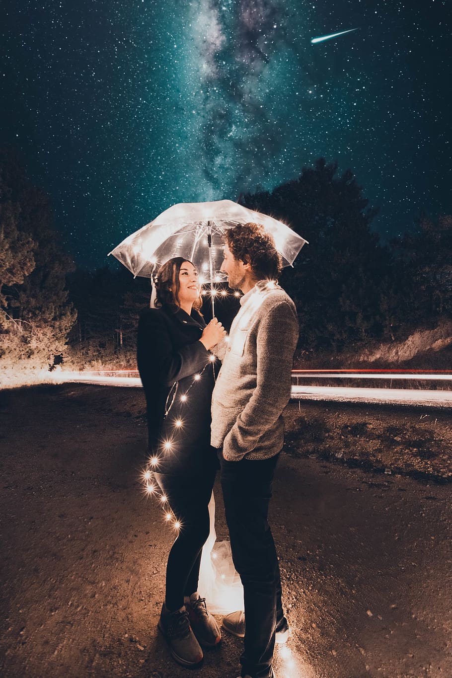 couple under clear umbrella with string lights during night, human HD wallpaper