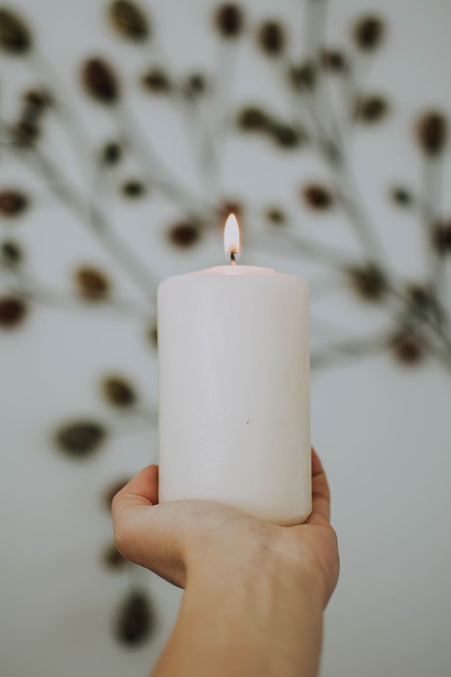 Photo of Hand Holding Lit White Pillar Candle, candlelight, flame HD wallpaper