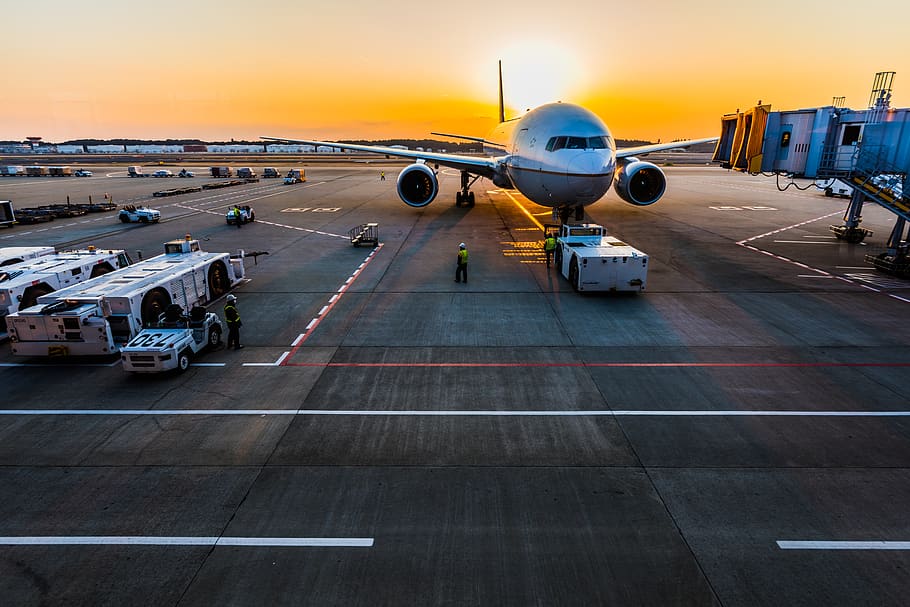 gray airplane on parking, airport, vehicle, human, person, airfield HD wallpaper