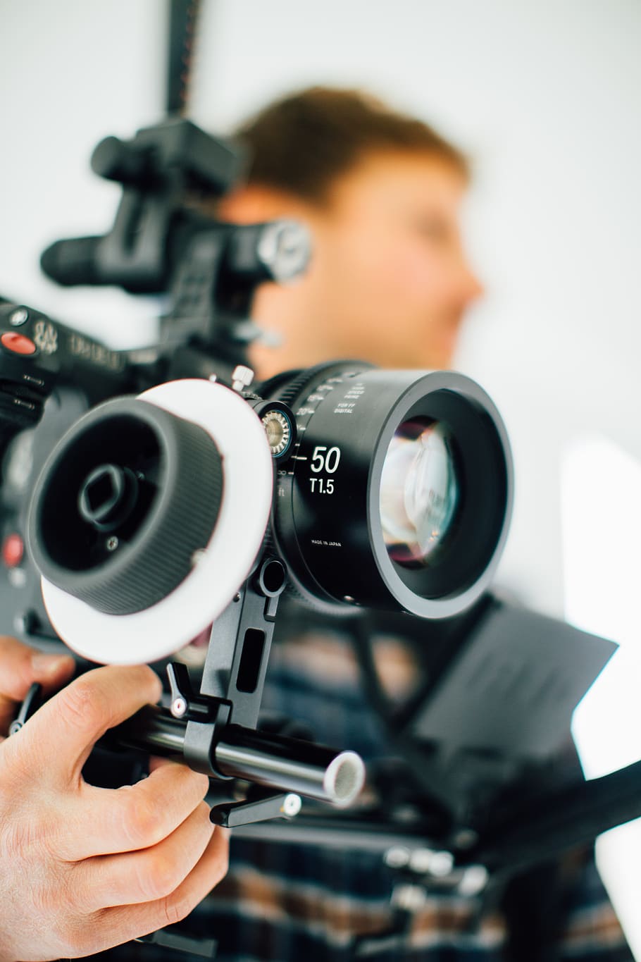 person holding camera stabilizer, technology, one person, indoors HD wallpaper