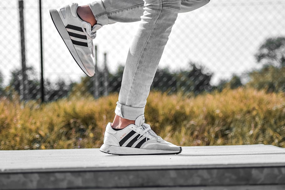 person wearing white adidas sneakers, shoe, clothing, footwear, HD wallpaper