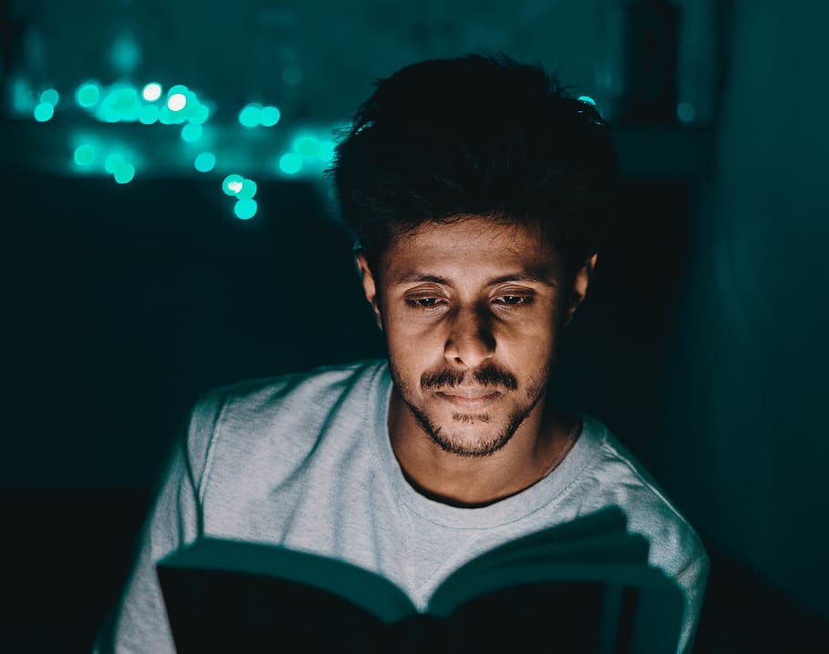 man reading book, one person, young men, front view, focus on foreground HD wallpaper