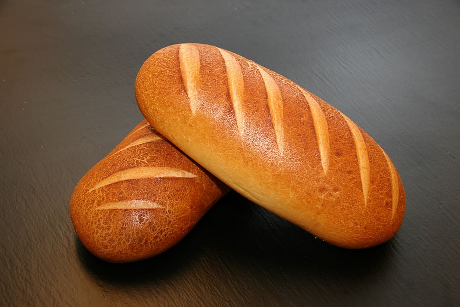 Two Brown Baked Breads on Table, buns, close-up, delicious, dining HD wallpaper