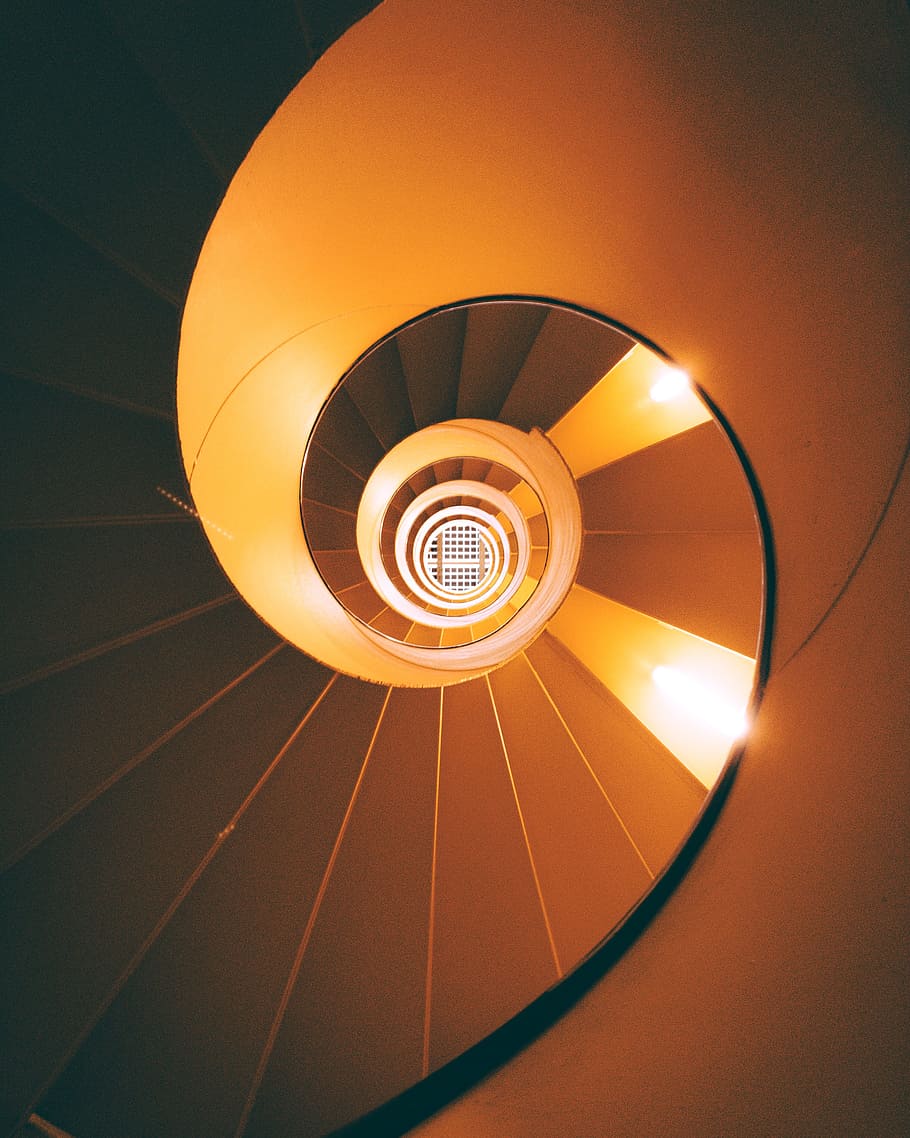 orange and brown spiral staircase, abstract, circle, hypnotic