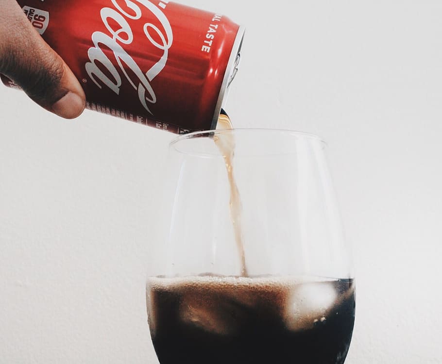 time lapse photography of person pouring can of Coca-Cola in wine glass, HD wallpaper