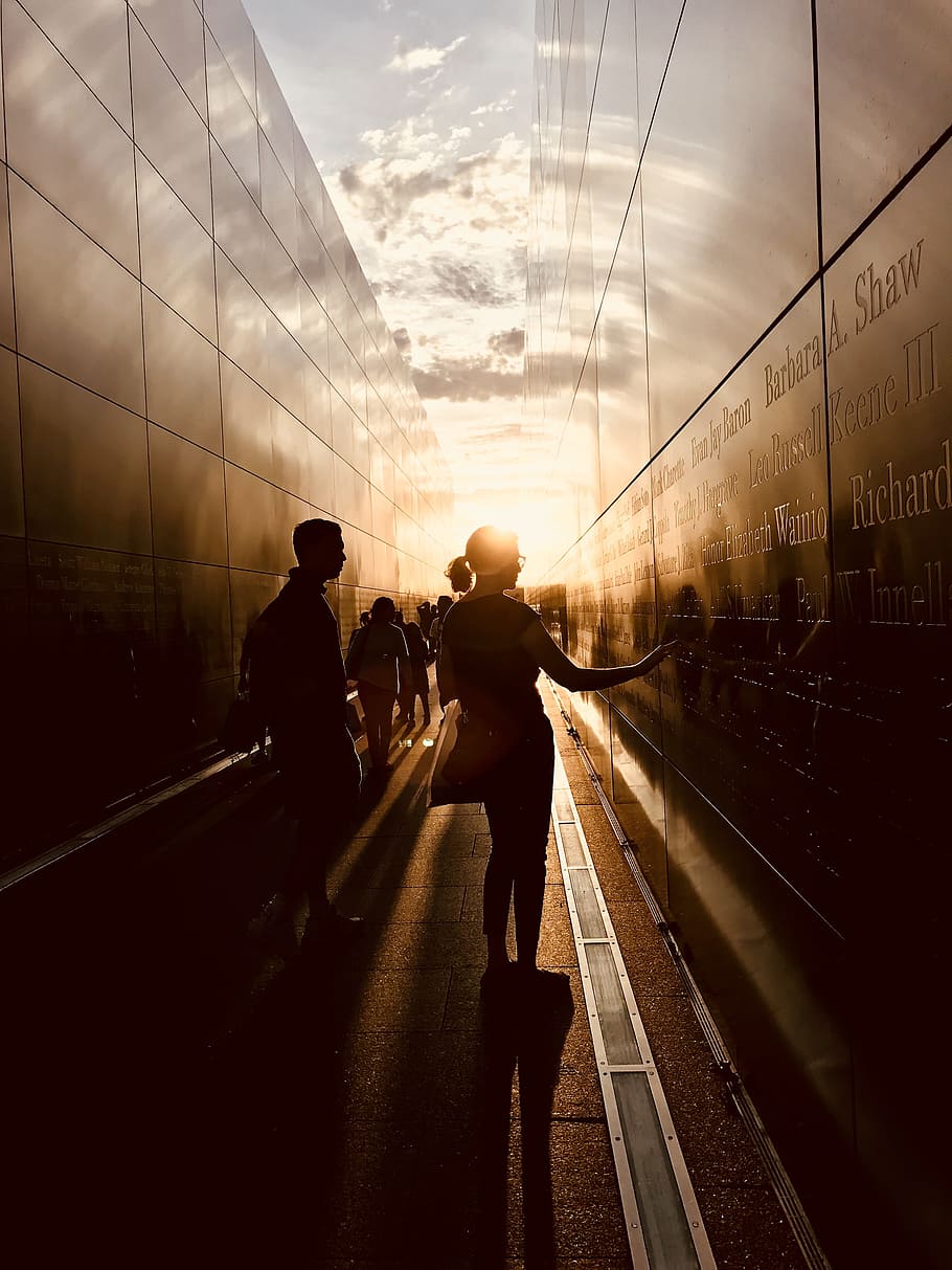 Woman Touching a Black Wall, 9/11, blur, city, clouds, dark, light HD wallpaper