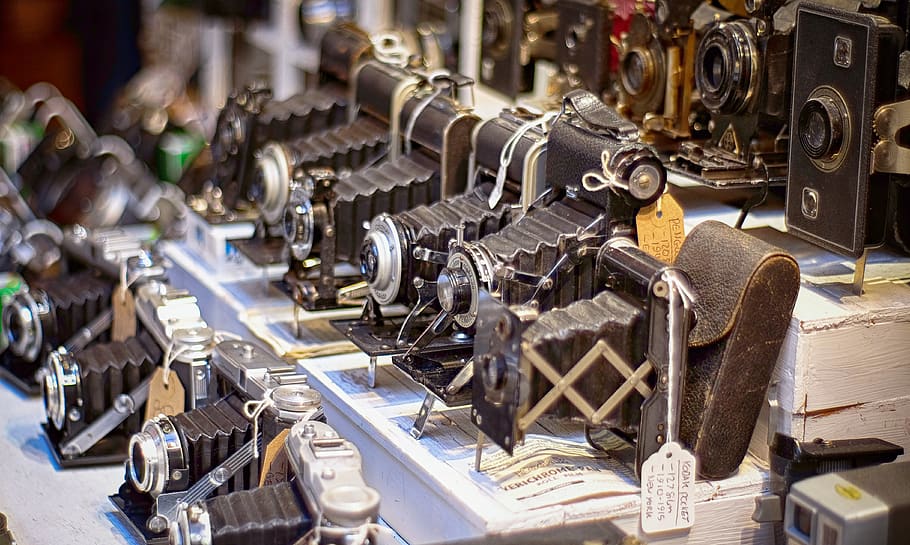land camera lot on display, machine, building, factory, motor HD wallpaper