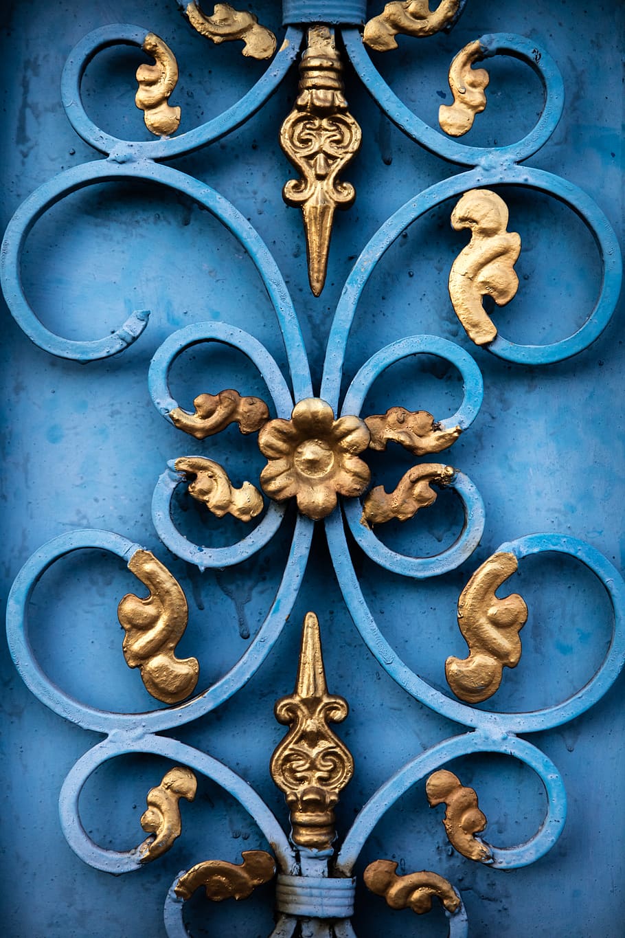 blue and yellow floral cutout decor, india, visakhapatnam, gold