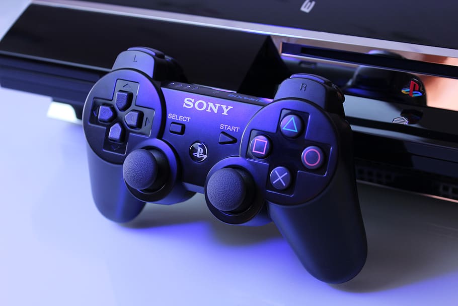 black Sony PS2 controller on white surface, technology, music, HD wallpaper
