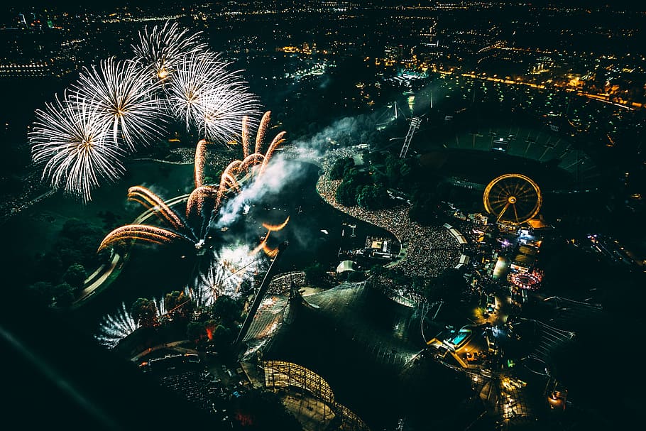 aerial photo of fireworks display, city, carnival, amusement park
