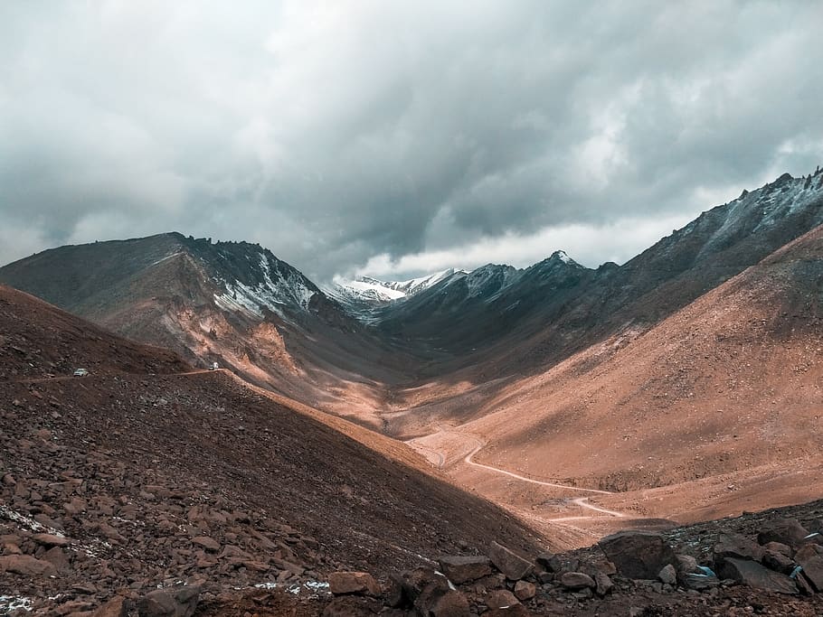 Scenic Photo of Mountains Under Cloudy Sky, clouds, daylight HD wallpaper