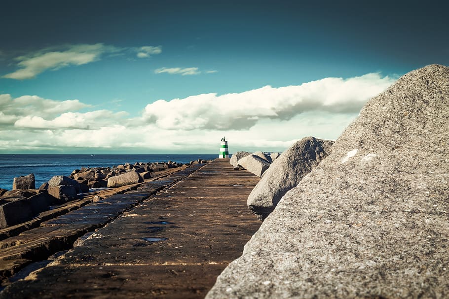 lighthouse, sun, jetty, sky, water, landscape, clouds, travel HD wallpaper