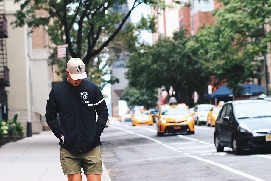 man walking on pathway hands on jacket pouch, person, people HD wallpaper