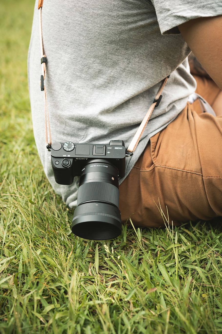 Black Dslr Camera in Person's Right Waist, adult, camera strap HD wallpaper