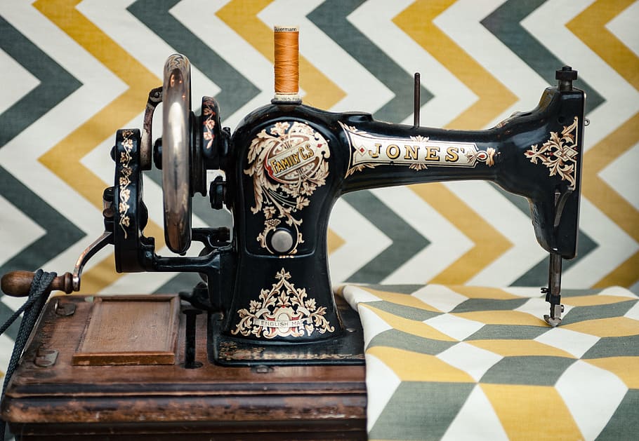 white and yellow chevron cloth on black sewing machine, old, creative