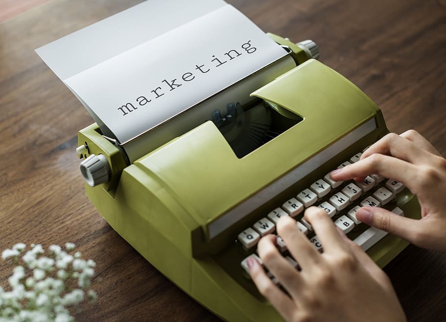 Person Typing on Green Typewrite, classic, flatlay, hands, indoors HD wallpaper