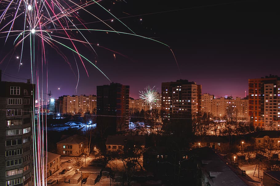 HD wallpaper: fireworks over gray concrete buildings, nature, outdoors ...