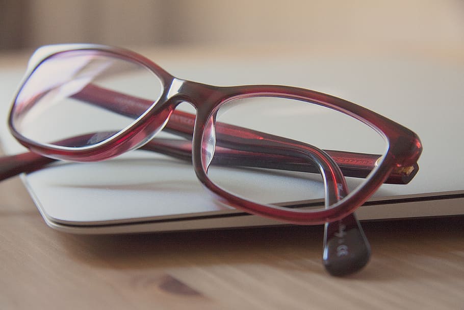 Eyeglasses With Red Frames on Laptop Computer, accessory, close-up HD wallpaper