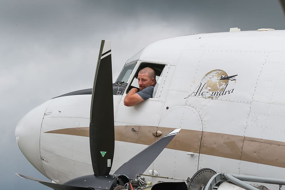 man inside the plane, airplane, aircraft, transportation, person HD wallpaper