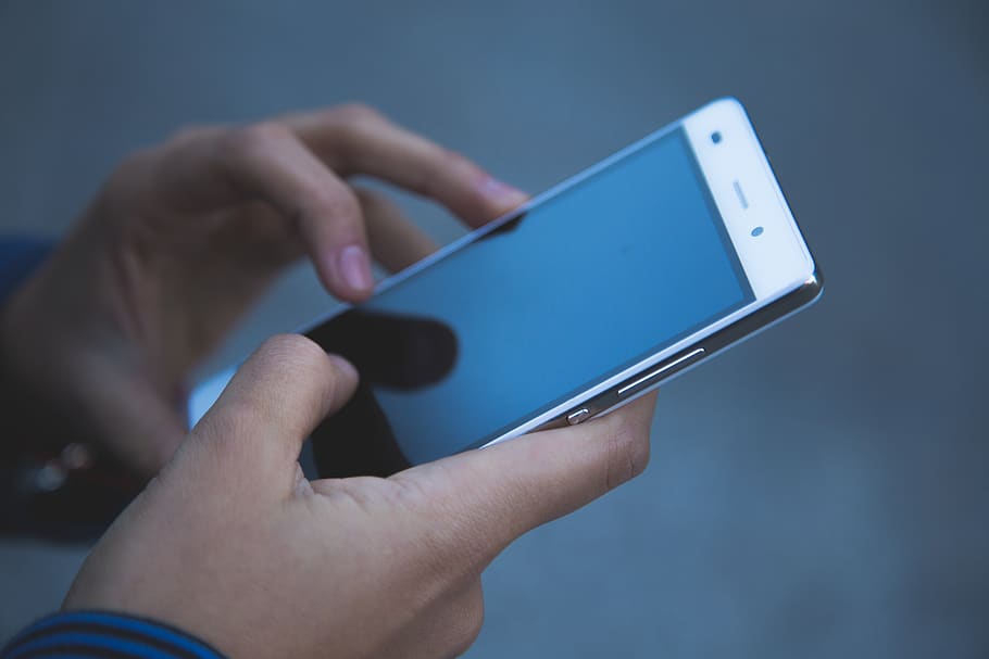 Person Holding White Smartphone, electronics, hands, technology HD wallpaper