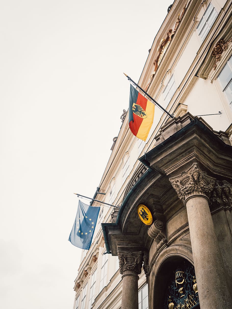 Two Flags Hanging On A Building, architecture, city, german, landmark HD wallpaper