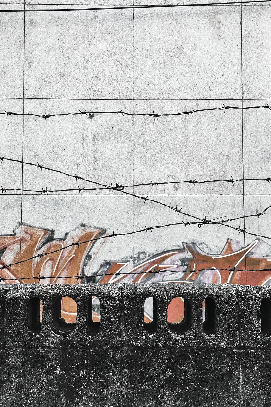 white concrete wall with orange and red graffiti, brick, barbed wire HD wallpaper