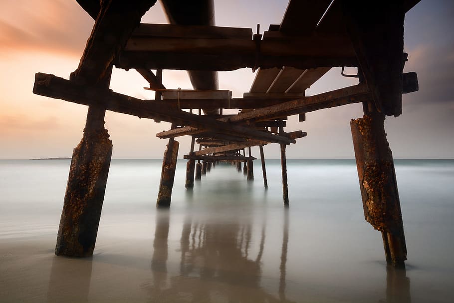 low-angle photo of brown sea dock, ocean, bech, hour, golden HD wallpaper
