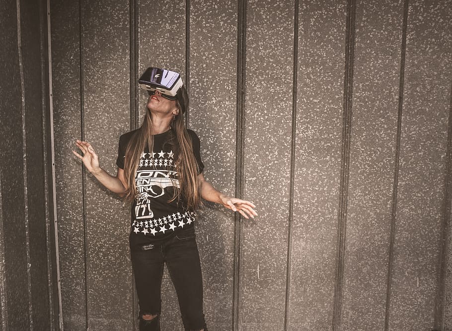 Photography of a Woman Wearing Virtual Reality Headset, brunette
