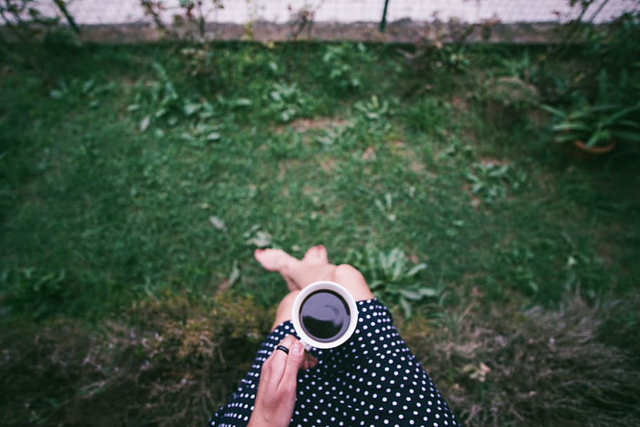person holding cup of coffee, mug, grass, bokeh, blur, relax HD wallpaper