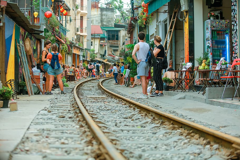 People Beside Train Rails, architecture, buildings, commerce HD wallpaper