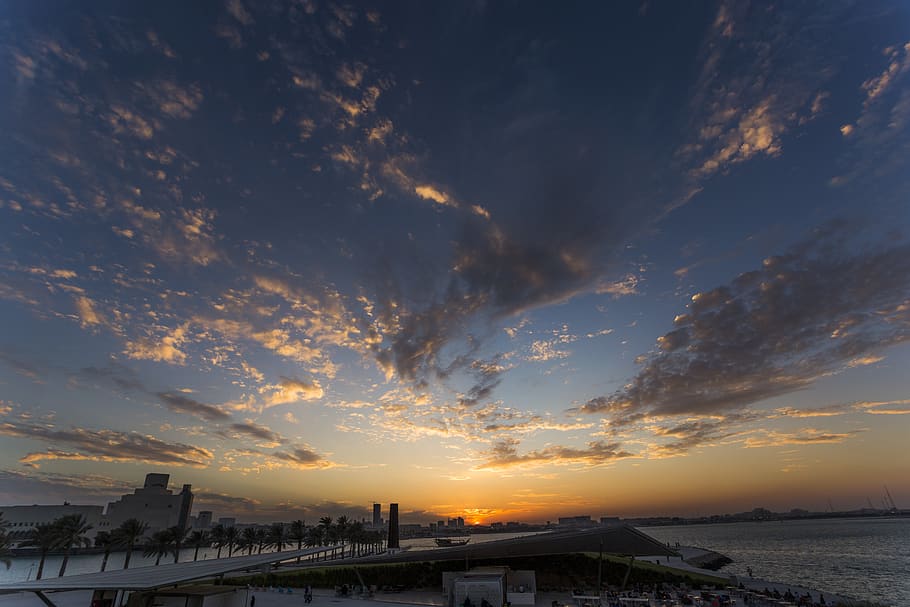 qatar, doha, sky, sunset, architecture, cloud - sky, water HD wallpaper