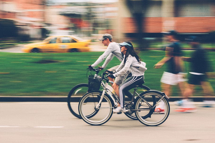 Woman and Man Riding on Bike, action, active, activity, adult HD wallpaper