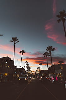 silhouette photo of cars during golden hour, street, cloudscape HD wallpaper